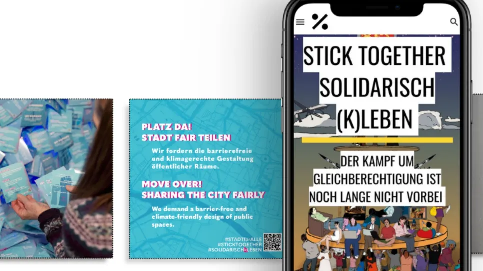 Smartphone mit feministischen Postern, Text: "Stick Together Solidarisch (K)leben."