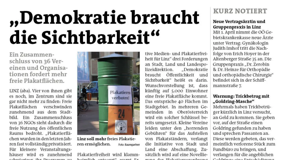 Zeitungsartikel über Plakatflächen in Linz mit Foto eines grünen Plakatsäule.