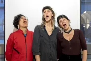 Three People making different expressions with their faces.
