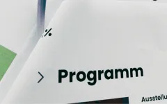 Ausschnitt eines Programmdokuments mit großem Text "Programm".